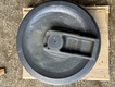Колесо натяжное на гусеничный экскаватор JCB JS130-220 (код: 215/12230, 333/E5075) Колесо натяжное на гусеничный экскаватор JCB JS130-220 (код: 215/12230, 333/E5075)