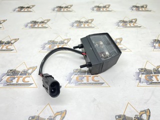 Фонарь освещения заднего номерного знака на JCB 3CX, 4CX (код: 700/21000, 700/50127)